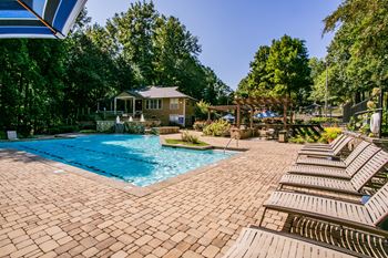 Sunbathing Deck at Swimming Pool at Park Trace Apartments in Norcross, GA 30092